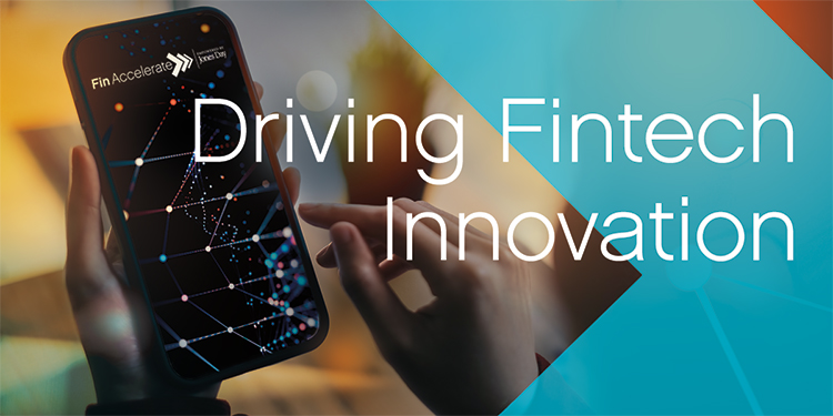 Person holding smart phone showing FinAccelerte logo